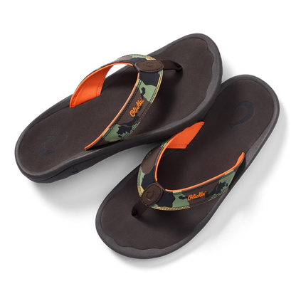 Pair of dark brown thong sandals with camo and orange straps, brown button closure, and cushioned footbeds.