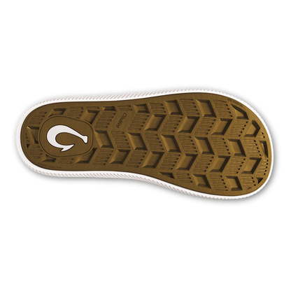 Shoe sole with tan tread pattern and white curved logo on tan and white outsole.