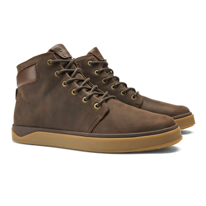 Pair of dark brown lace-up boots with toffee-colored rubber sole and padded ankle collar.