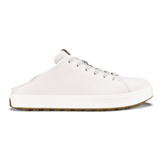 White leather slip-on sneaker with tan and brown sole, lace-up closure, and padded collar.