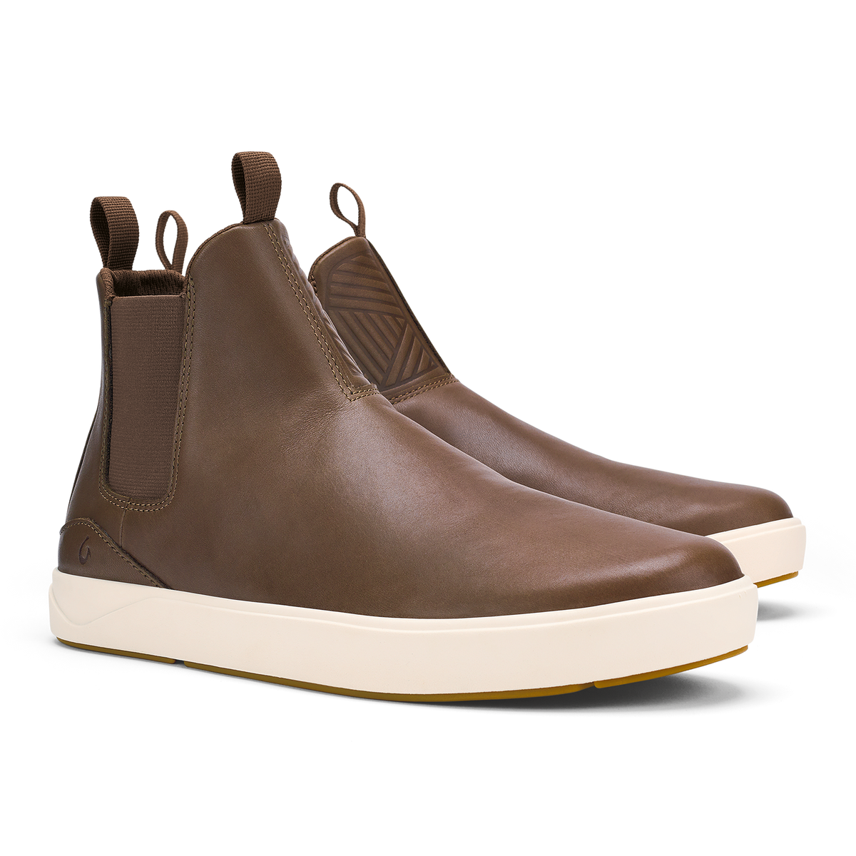 Brown leather Chelsea boot with cream-colored platform sole and elastic side panel.