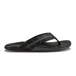 Black thong sandal with textured upper strap and flat sole, shown in profile view.