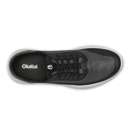 Dark gray and black mesh sneaker with black laces and white sole, shown from above.