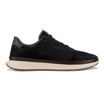 Black lace-up sneaker with mesh and suede upper, dark brown heel tab, and cream-colored sole.
