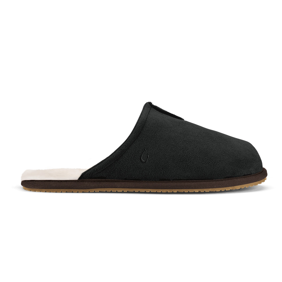 Black slipper with cream-colored inner lining, brown sole, and small emblem on the upper.