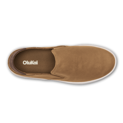 Tan leather slip-on shoe with white sole, shown from above.