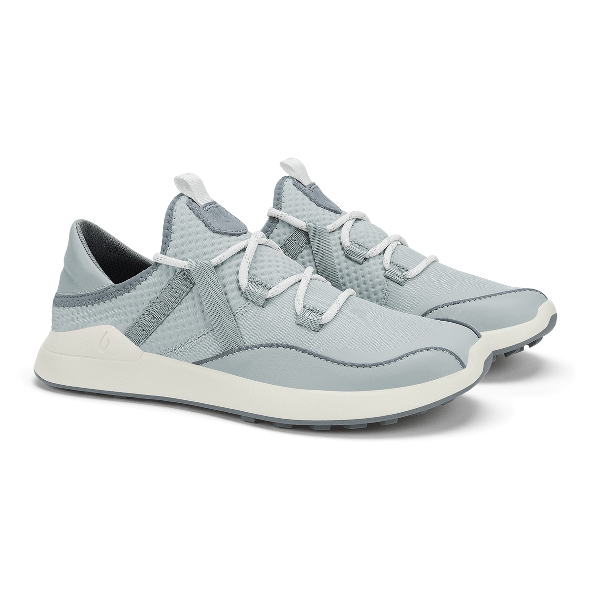 Cloud grey sneakers with white velcro straps, textured mesh upper, and cream-colored sole.