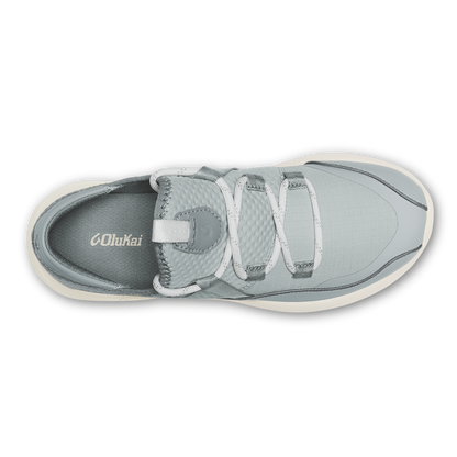 Cloud grey and white athletic shoe with three hook-and-loop straps and cream-colored sole, viewed from above.