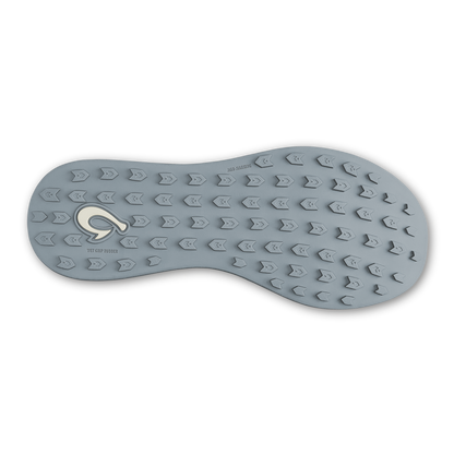 Cloud grey shoe sole with repeating arrow tread pattern and embossed logo detail.