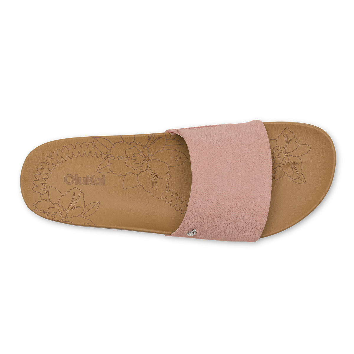 Slide sandal with warm sand-colored footbed featuring floral design and soft pink fabric upper band.