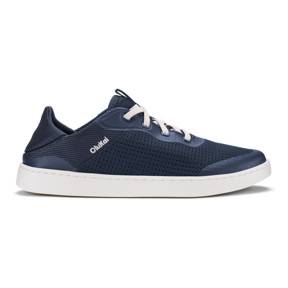 Trench blue perforated sneaker with white laces and white sole, viewed from the side.