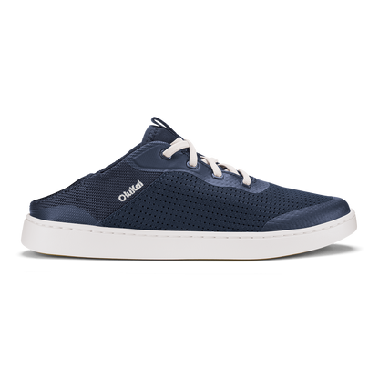 Dark blue perforated slip-on shoe with white laces and white sole.