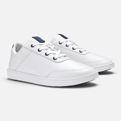 Pair of white leather sneakers with dark blue heel tabs and white laces.