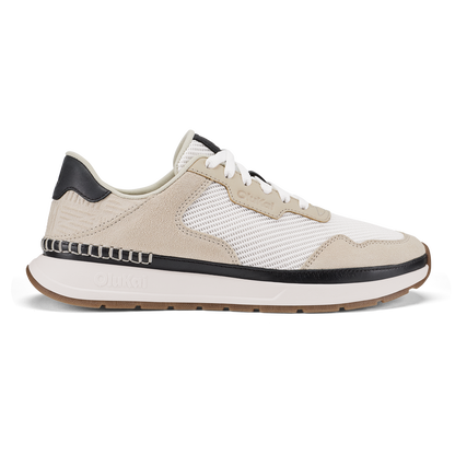 Koke sneaker in bright white and ecru with black heel counter and trim, mesh and suede upper, white midsole, and tan rubber o