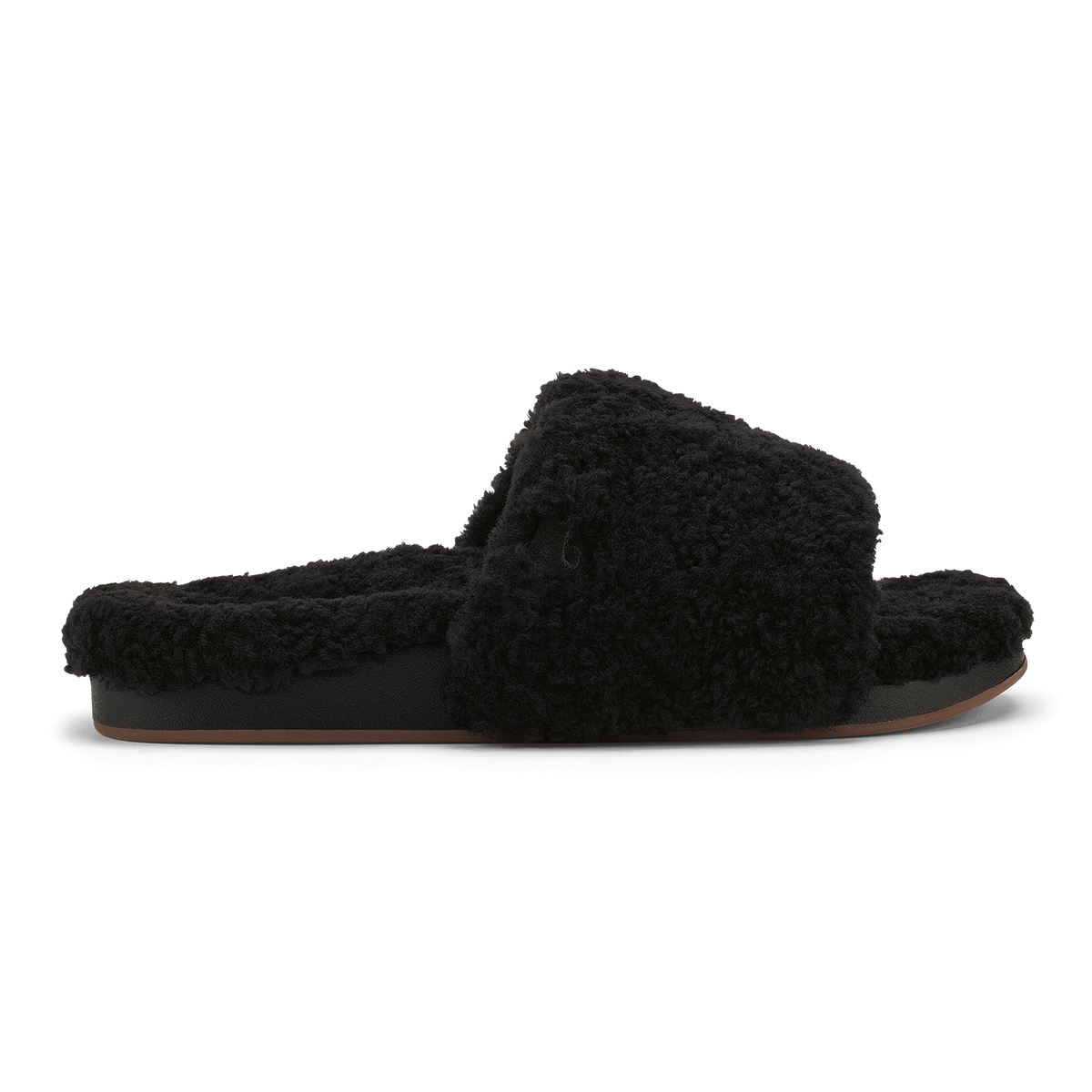 Black fuzzy slip-on slipper with cushioned sole and fluffy upper, shown in profile view.